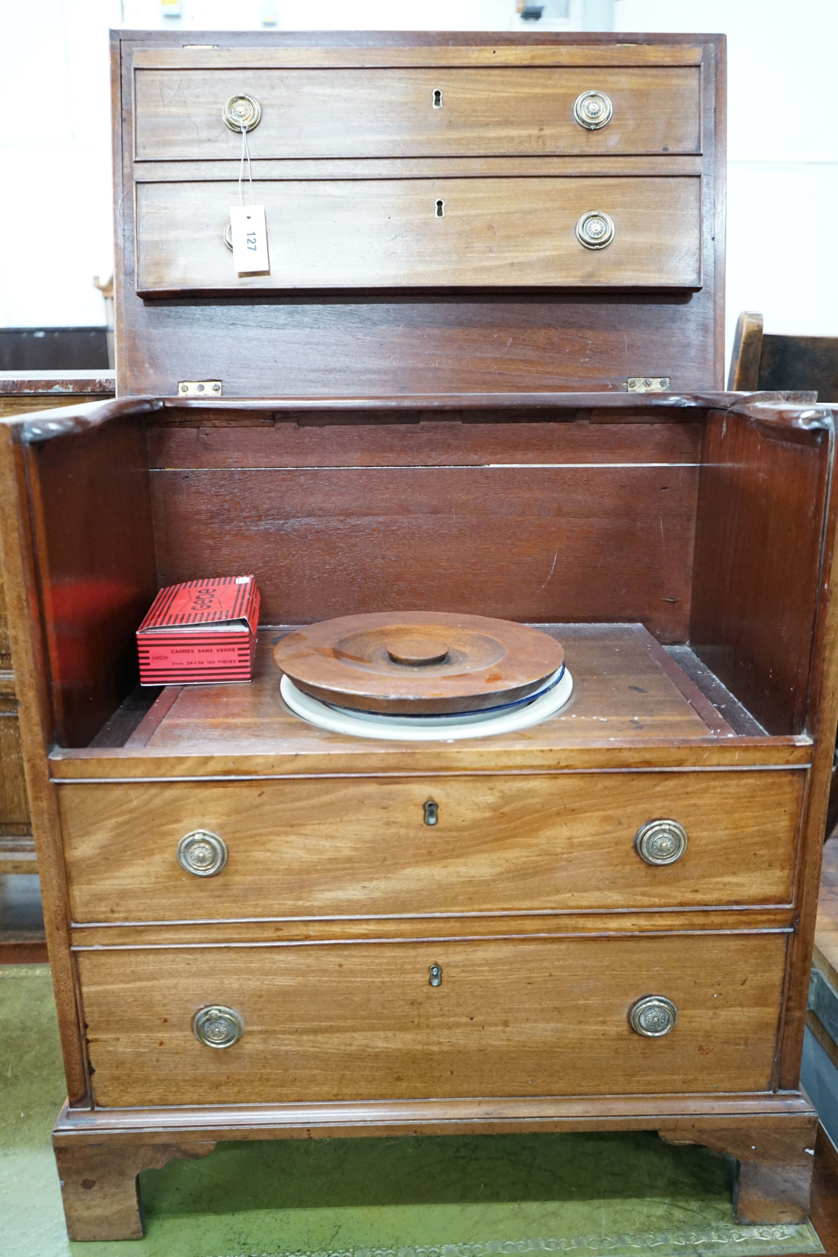 A George III mahogany hinged top commode with dummy drawer front and brass handles, width 66cm, depth 42cm, height 74cm